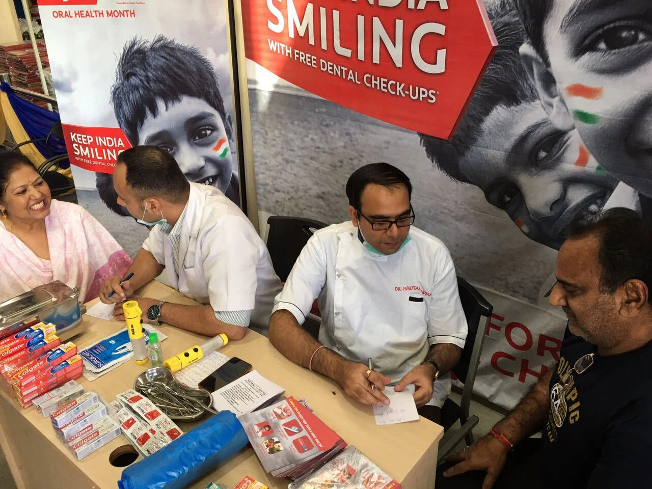 Dr. Gautam Sharma taking part in a community dental check-up camp